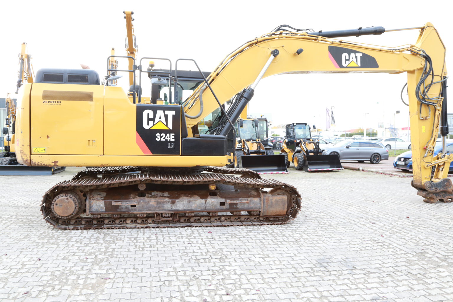 CATERPILLAR 324 ELN *with 5 attachements*and *transport width 299cm*